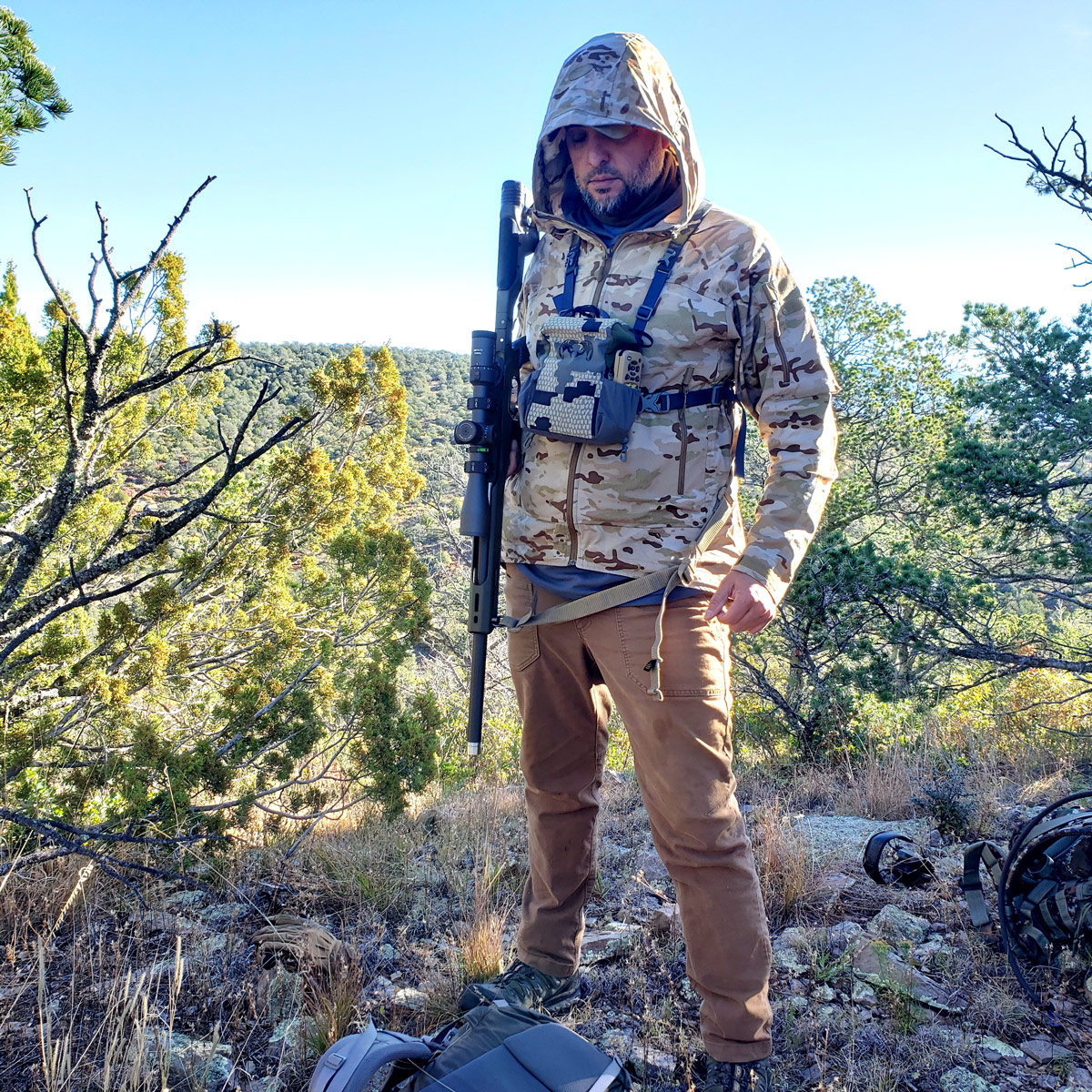 Layers, camouflage shell from First Spear, 5.11 pants, Solomon boots, waterproof binocular harness for my rangefinder, Kestrel 5700, and cell phone/OnX Hunt. Minutes after harvesting a New Mexico Mule Deer.