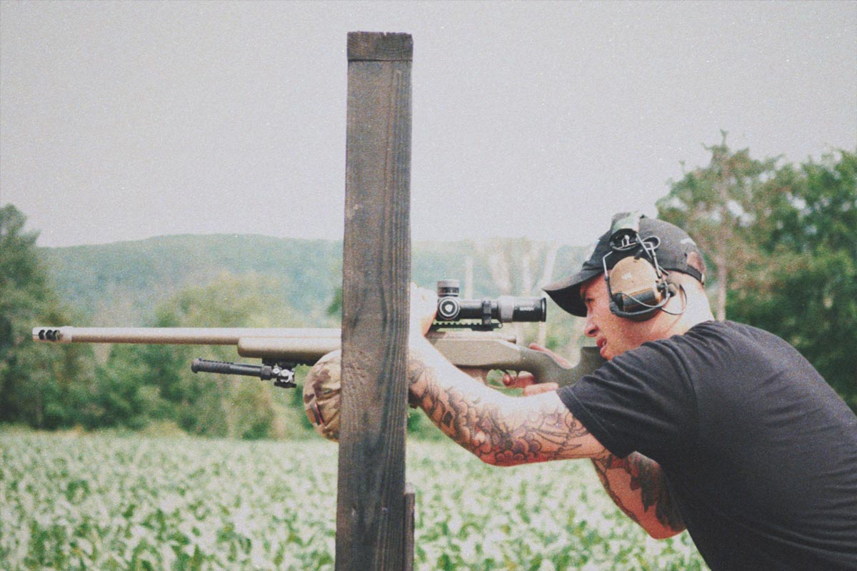 Remington 700 stock rifle shooting off of barricade